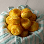 Keto hush puppies piled up in a basket