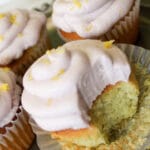 lavender frosting topped with frosting and lemon zest