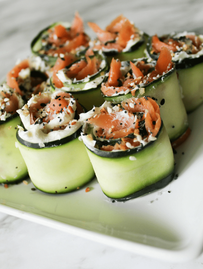 Lox and bagels are one of my all time favorite combinations. This recipe for Lox and Cream Cheese Cucumber Rolls brings all the delicious flavors you want in a typical lox and bagel dish - with none of the carbs. Share it at parties as a delicious and fresh appetizer, or keep it to yourself for a great no cook meal!