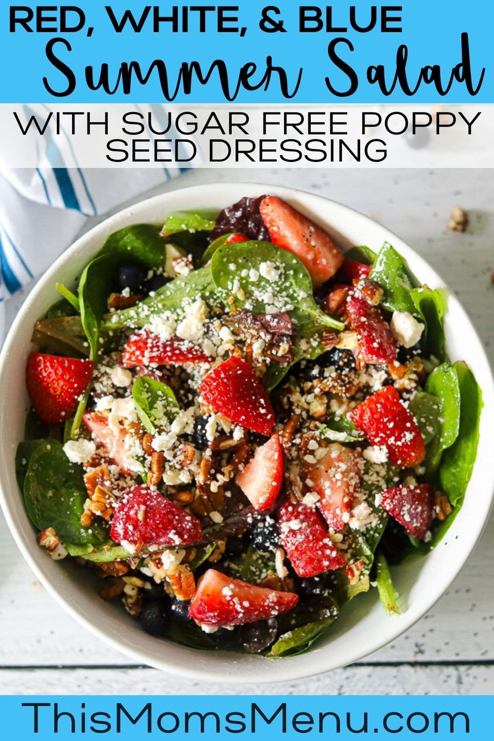 a large white bowl full of lettuxe, strawberries, pecans, blueberries, and feta cheese, with text overlay.