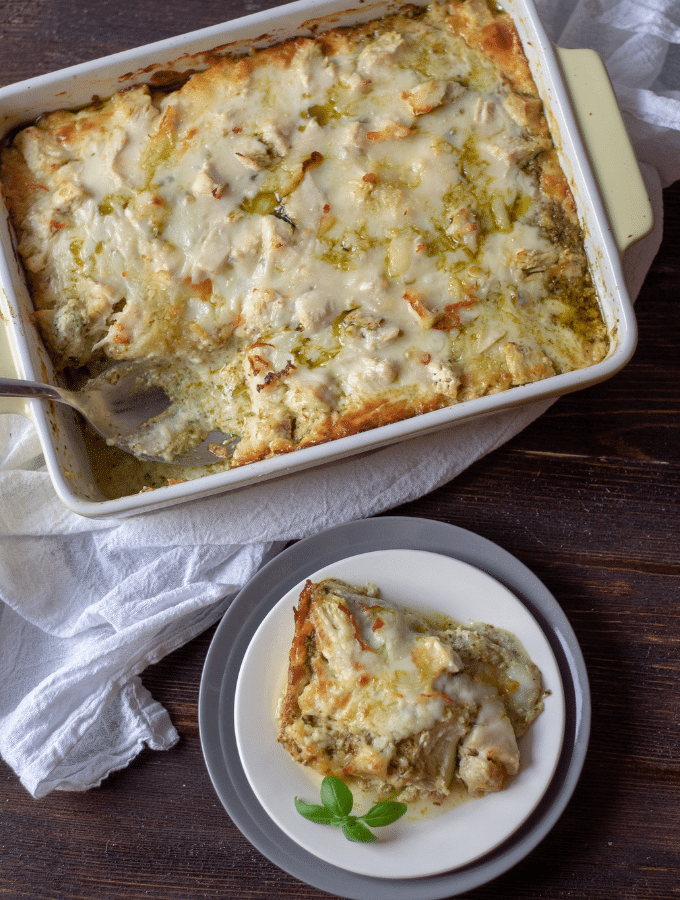 A casserole of low carb chicken pesto lasagna with zucchini noodles