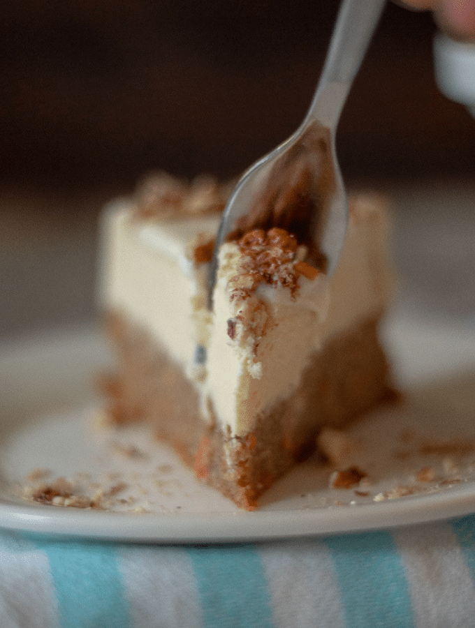 a close up picture of keto carrot cake cheesecake