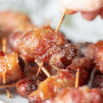 Bacon and Brown Sugar Little Smokies from the air fryer piled on a white plate