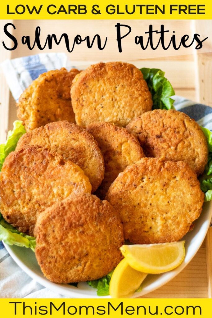 a white plate full of low carb salmon patties and lemon wedges with text overlay
