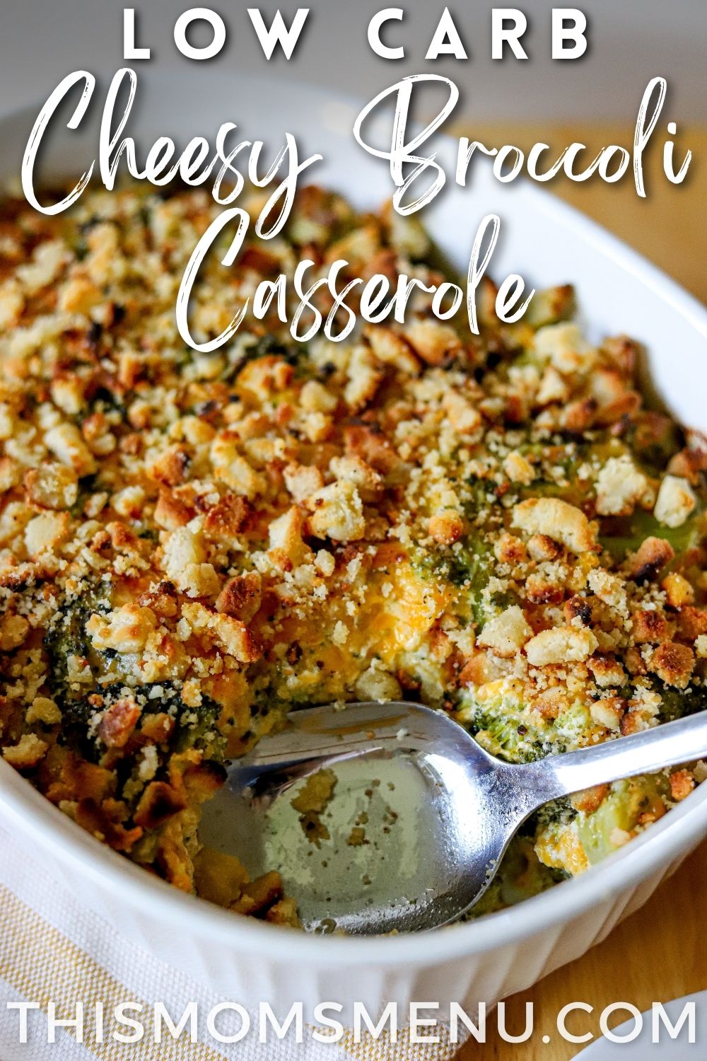 a white dish full of baked broccoli and cheese casserole