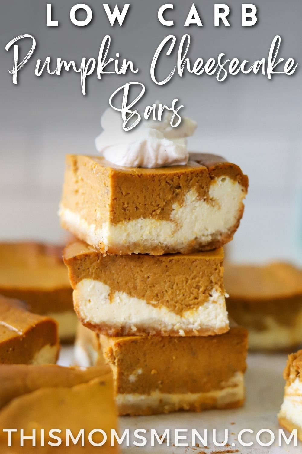 three pumpkin cheesecake bars stacked and a text overlay