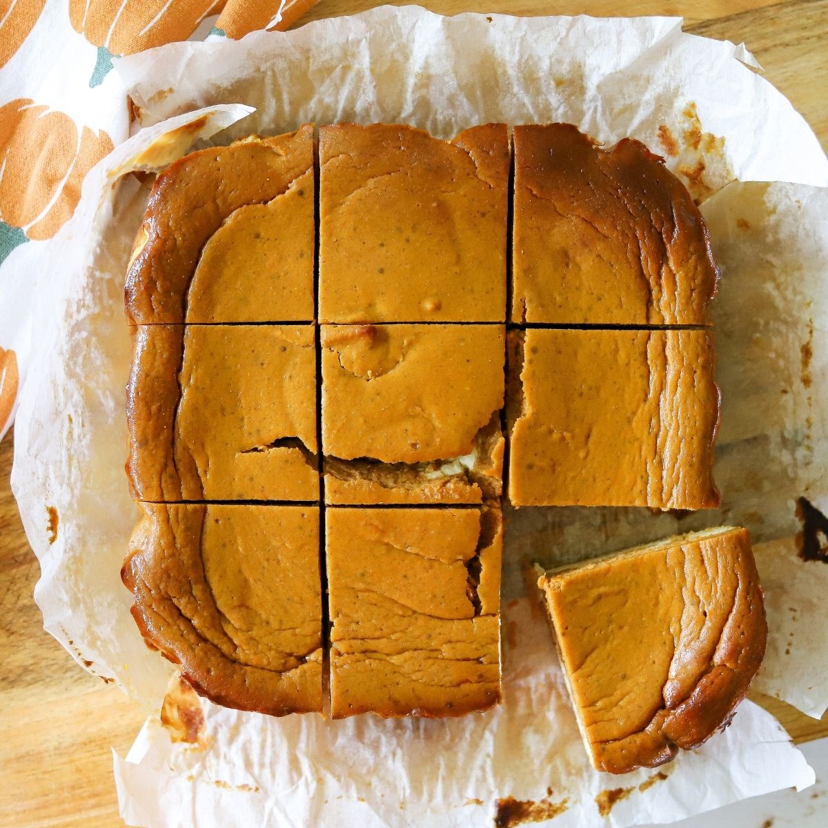 pumpkin pie cheesecake bars cut into 9 slices