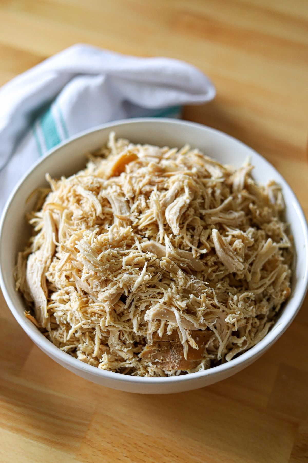 shredded chicken breast for meal prep in a bowl