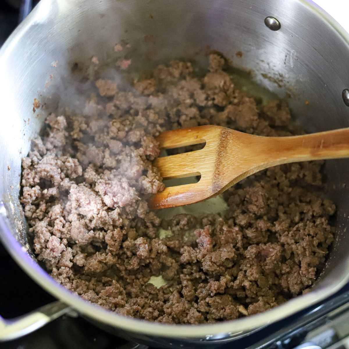 ground beef cooking in a pot