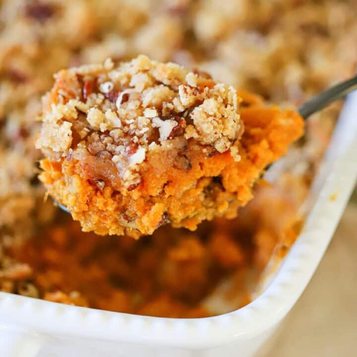 a sweet potato casserole topped with a crunchy topping