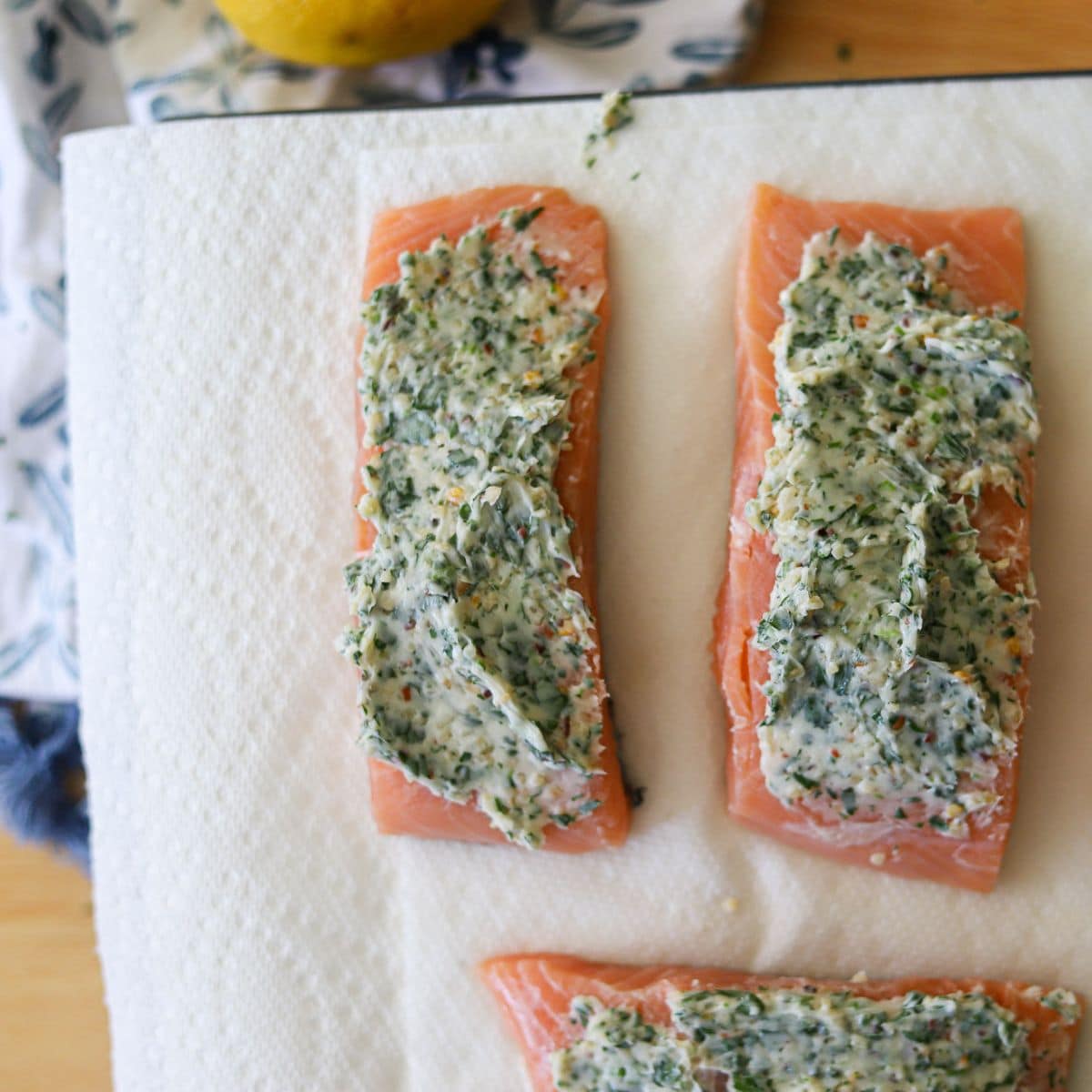 salmon filets topped with a buttery garlic paste