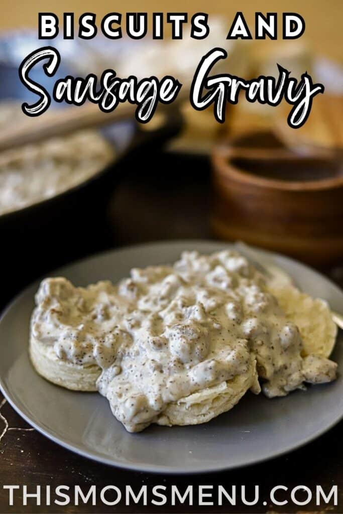 a grey plate full of biscuits and sausage gravy