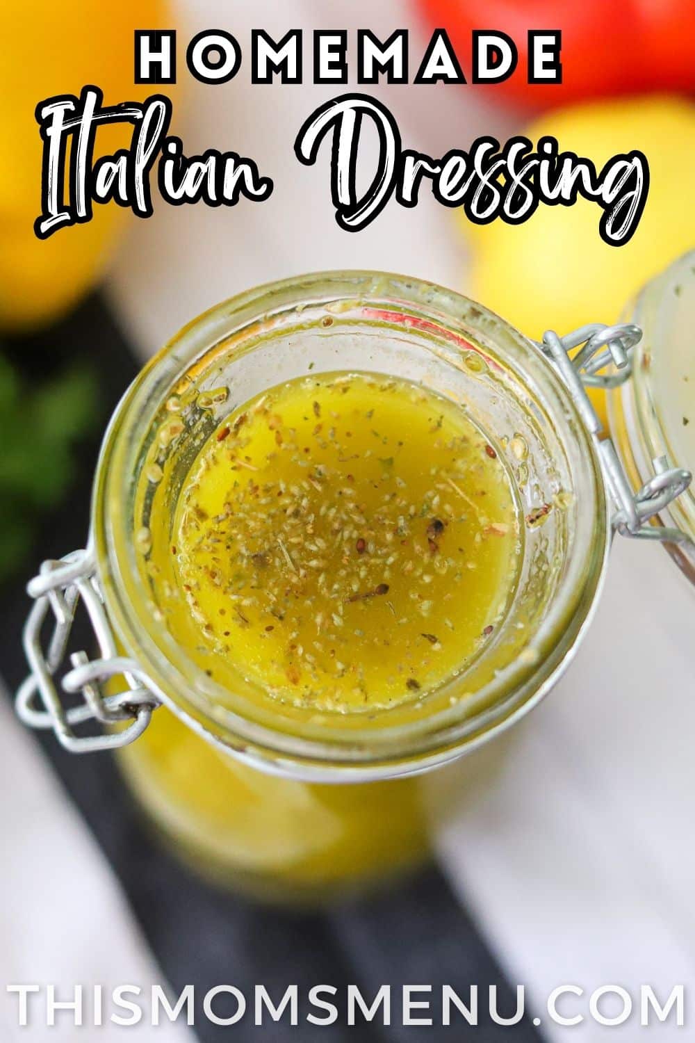 a jar filled with homemade zesty italian dressing