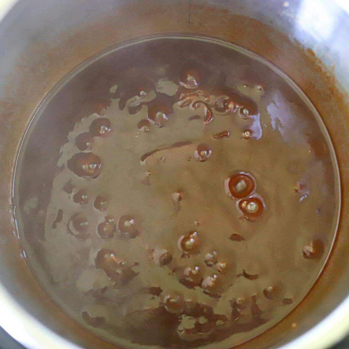 bbq sauce simmering in an instant pot